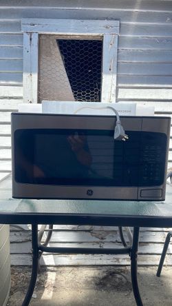 a GE 1.1 cu. ft. Countertop Microwave
