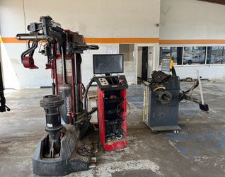 Tire changer and wheel balancer