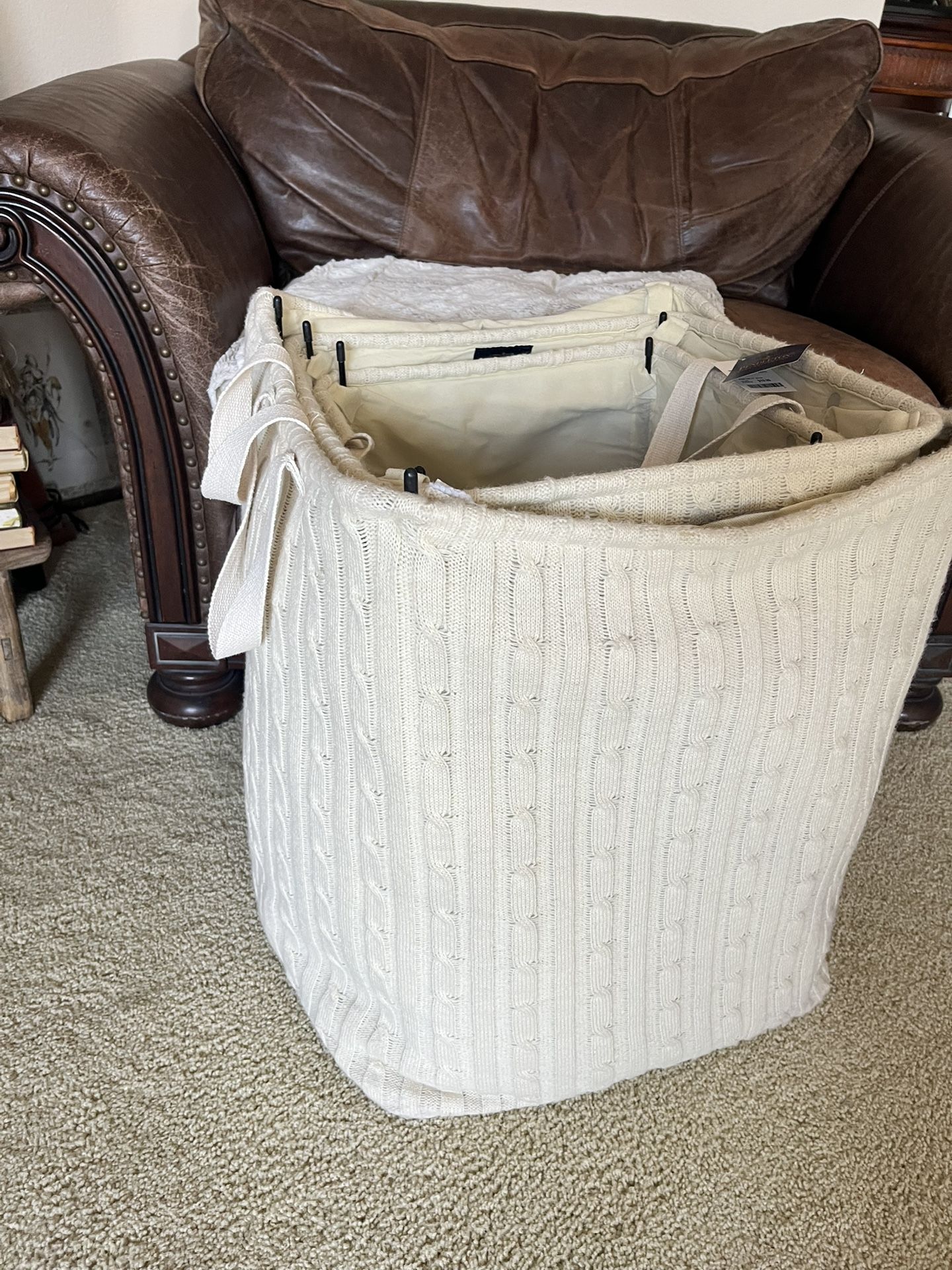 Set of three Pendleton home collection cableknit storage baskets. Soft cream, color with handles and removable liners, stylish and functional for blan