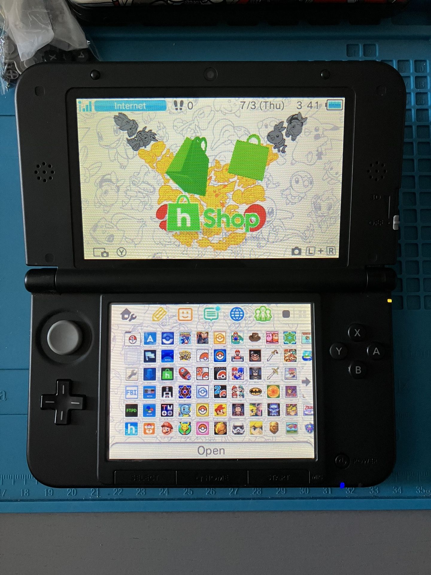 Nintendo Silver 3DS XL With Pokemon Bank, Pokemon DS, Stylus, 64 GB SD Card