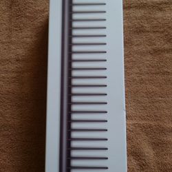 Dyson-designed Detangling comb (Iron/Fuchsia)