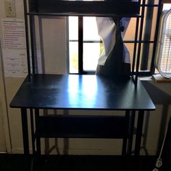 Computer desk with shelves