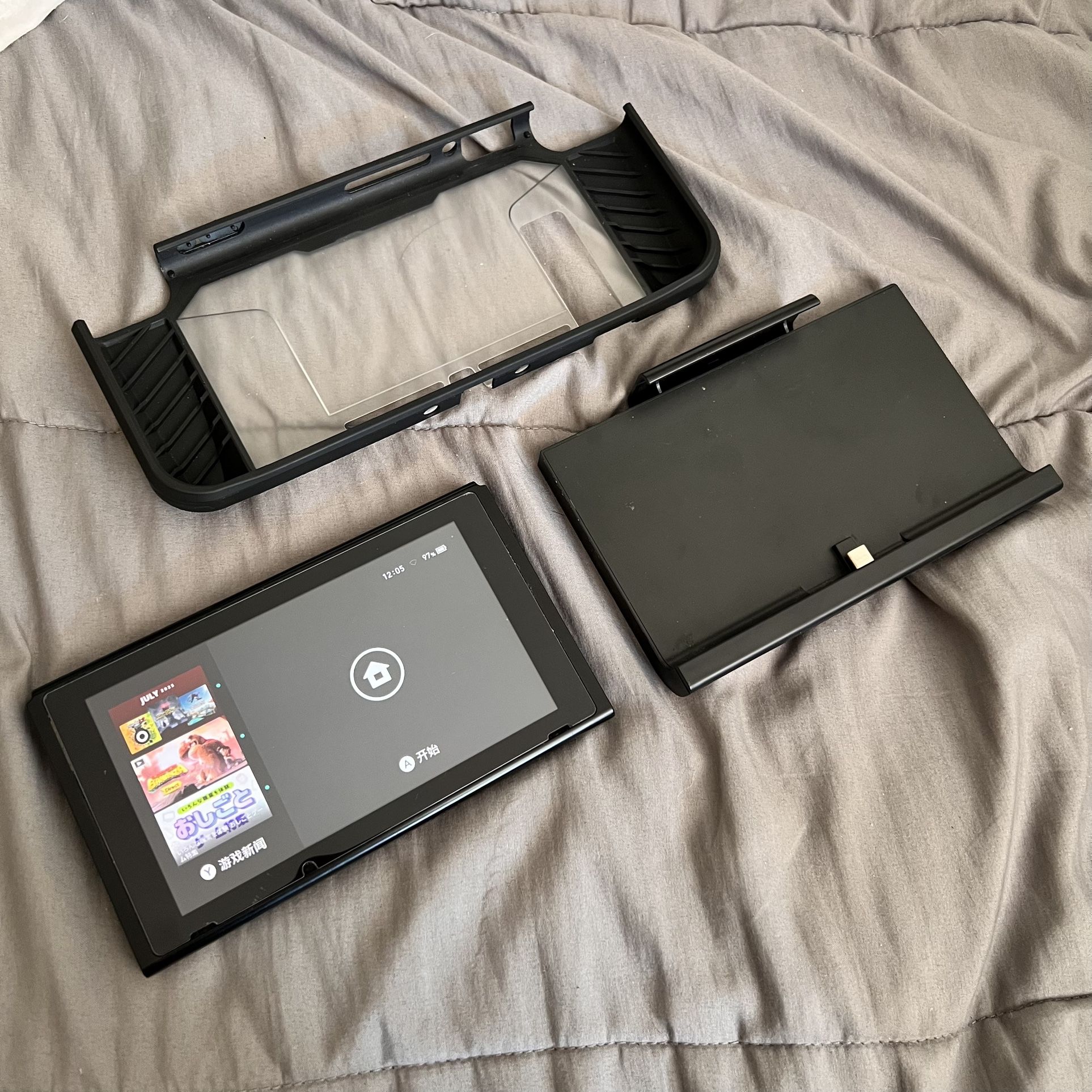 Nintendo Switch console, case, extra battery