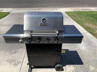 Like new 4 burner fire king grill