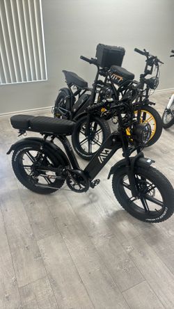 Brand new with 1 year local warranty - easy to carry stepthru moped style Ebike
