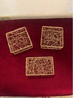 Three elegant gold metal wire boxes