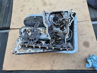 GM 6.0L LS valve covers, front timing cover, rocker rails, cam drive gear with chain.