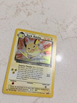 Dark Raichu (#83/82) — Team Rocket