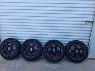 15' Black  Motergimr 116 tires and wheels