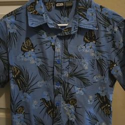 This is a Star Wars Chewbacca blue Hawaiian Size S short-sleeve button-down shirt. 