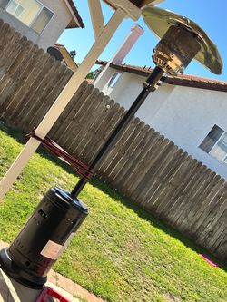Propane outdoor heater big tall works great must sell yard party heater