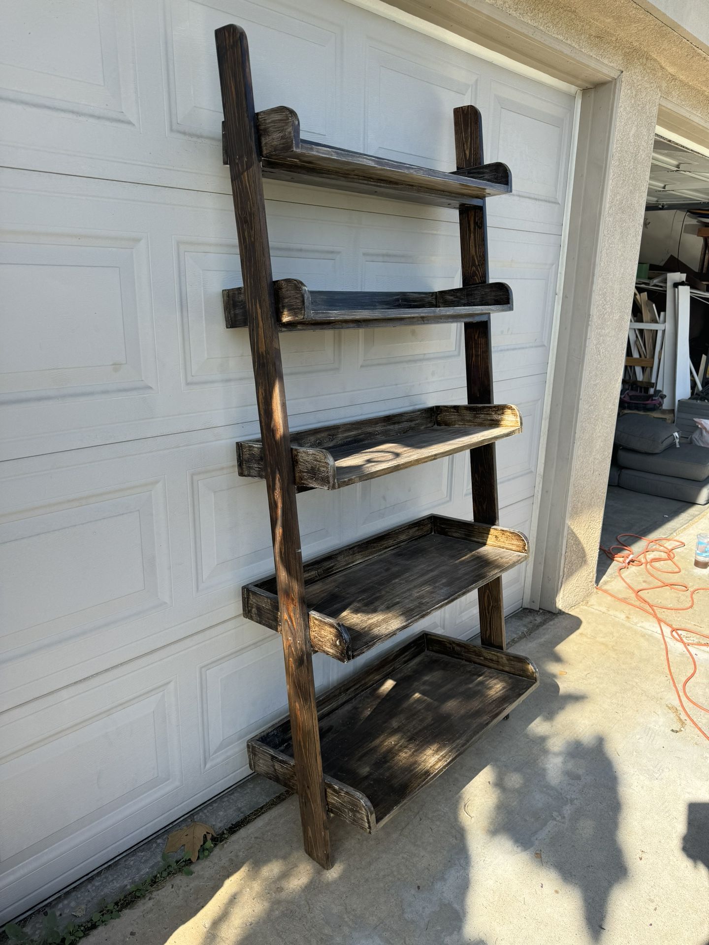 Rustic wooden ladder bookshelf
