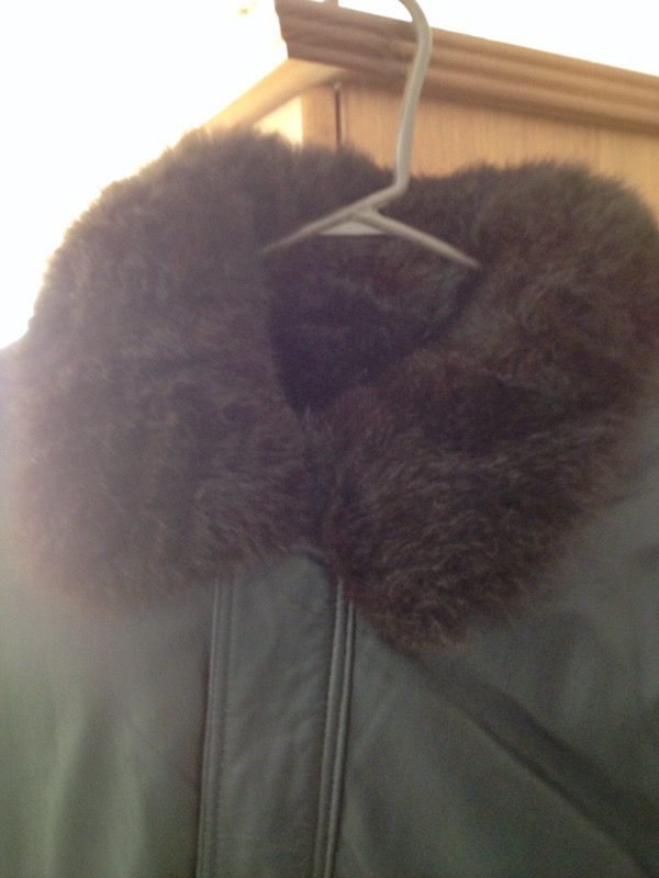 Men's genuine leatherjacket by Andrew Marc with real fur zip in liner.