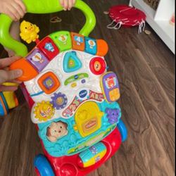 Baby walker+ activity songs/toys (gets detached)