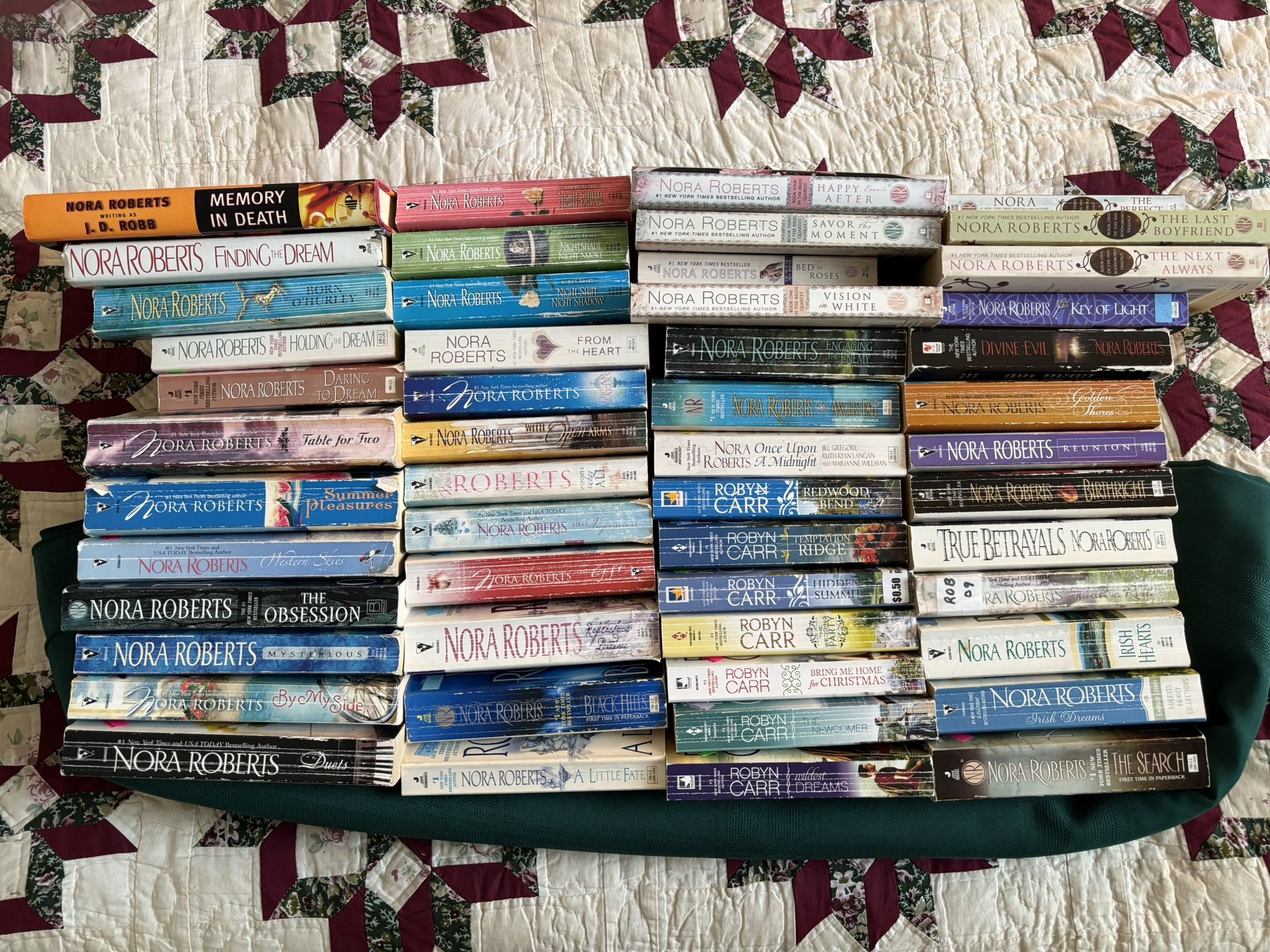 Nora Roberts and Robyn Carr Novels, lot of 51. Good condition. 44 popular Nora Roberts novels, 7 popular Robyn Carr novels.
