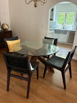 Round Glass Top Dining Table with 4 Chairs. 48” diameter x 30” height. Pick up in Santa Monica.