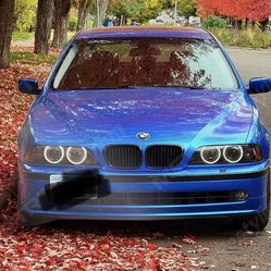 2005 BMW E 39 color shift paint starlight roof, red interior