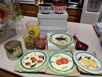 All 17 items are $10 in total; 8 blur & red ice cream bowls, 4 desert plates 8", large Chinrsr wood spoon, Bath & Body candle by Slatkin, 3 glass cand