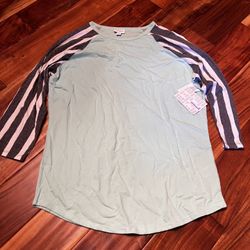Women’s new mint Lularoe Randy shirt. Size large