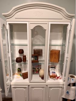Wooden and glass cabinet with lighting