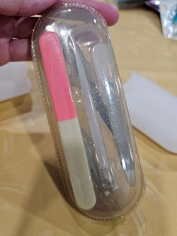New, never used 6 piece manicure, pedicure set with holder.