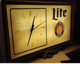 Vintage Miller Lite wall Clock - light and clock work great.