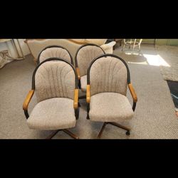 Four Swivel Chairs 