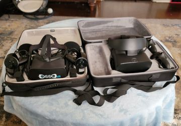 Oculus Rift & Rift S VR Headsets With Accessories Cables And Controllers Plus Carrying Cases