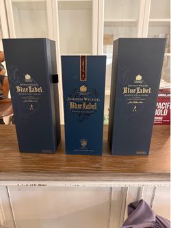 Empty blue label scotch bottle with box