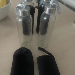 Set Of 4 Bottles For juice Etc 