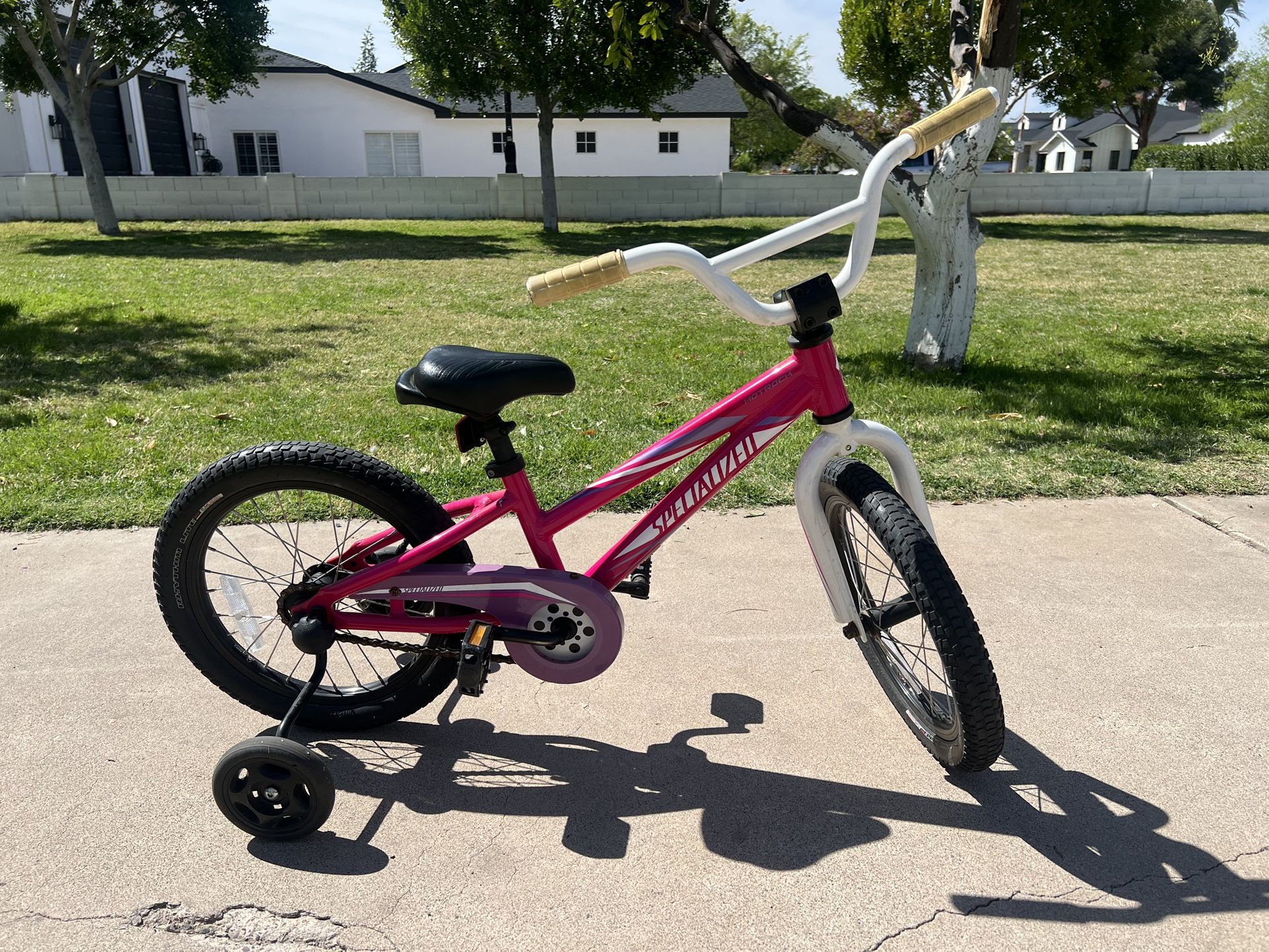 Pink Specialized Training Wheel bike