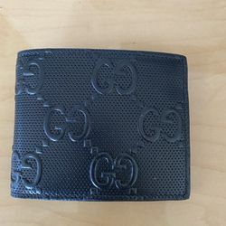 Gucci Embossed Bi-Fold Wallet