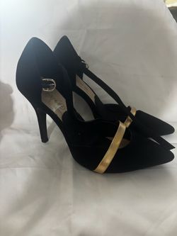 Black and gold Heels size 7.5