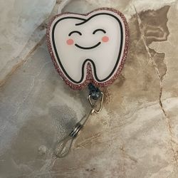 Tooth Badge Reel