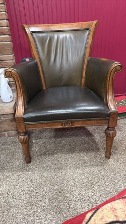Mahogany wood and leather armchair