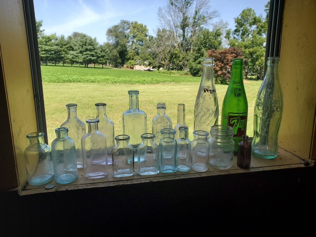 Antique medicine Coke Pepsi,and 7Up bottles