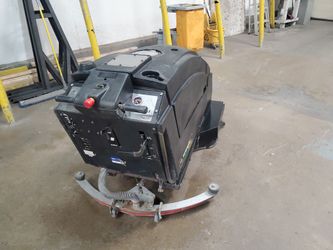 Wrangler 3330 Scraber Machine.  Needs Battery 