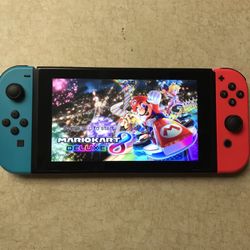 NINTENDO SWITCH with 125 POPULAR SWITCH GAMES INCLUDED