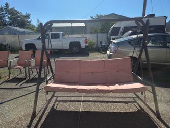 metal swing and a chairs set