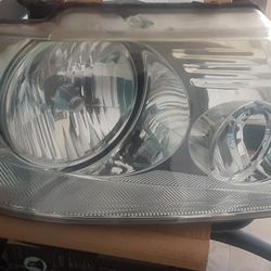 05 Ford F150 Left Headlights