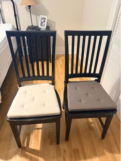 2 wood chairs painted black