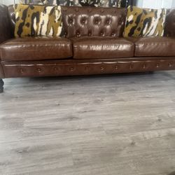 barley used camel leather modern sofa. retail $2500 will sell for $899
