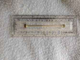 Slide Ruler And Proco Rule
