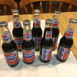 Seven long neck Richard Petty Pepsi bottles