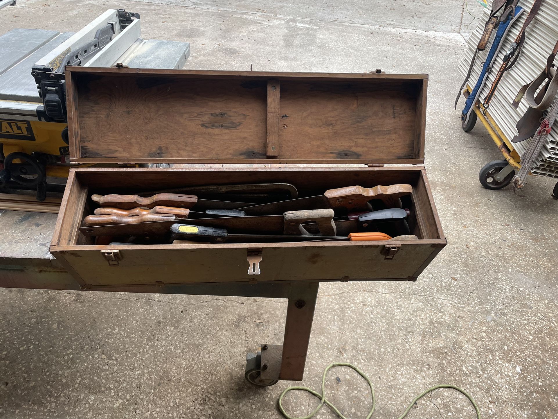 antique saw box with saws