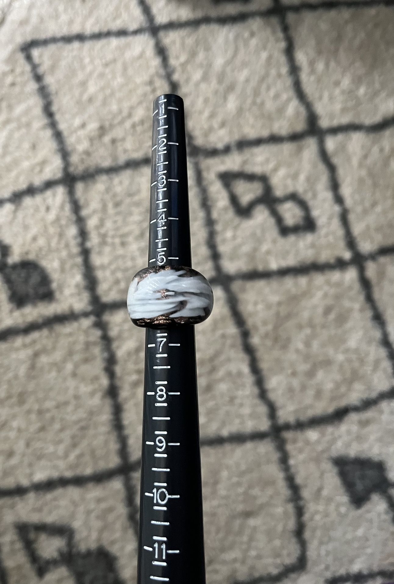 Black and white ring