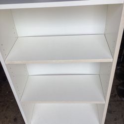 3- Shelves Bookshelf/ Bookcase. (White.) Like Nev. Dimensions are; 23-1/2”W—  11”D— 41-3/4”H. 