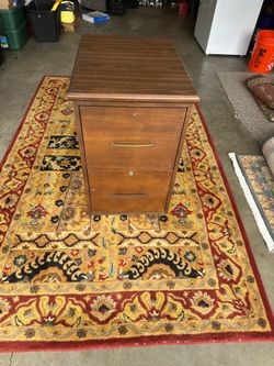 Assortment of small tables and rugs Assortment of small tables and
