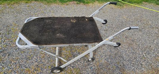 Ferno Model 289 "Easy Loader" with a 300 lb capacity and a 50" platform.