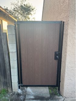 Vertical composite wood gate